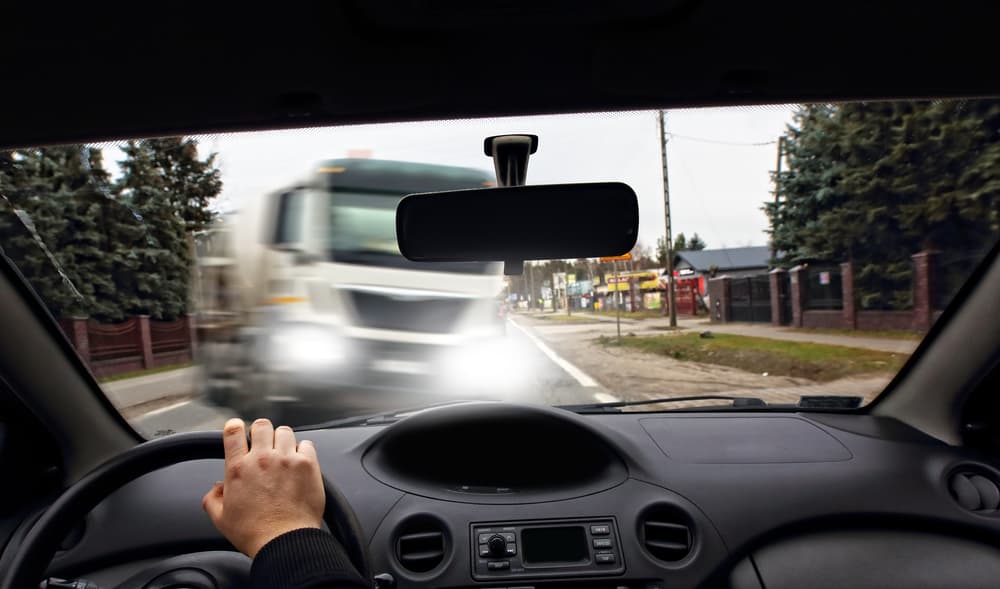 frontal collision of a car with a truck